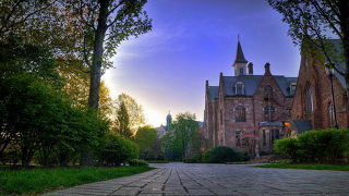 The sun setting over President's Hall 