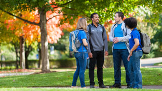 A photo of happy students on campus.