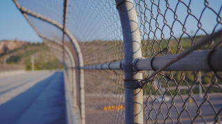 image of chain link fence border wall