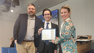 Museum Professions graduate student Ethan Wojciechowski with Professors Henry and Tsuria