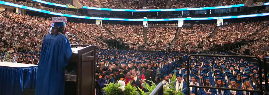 Commencing Student in Speaking in Front of graduates and families at the Prudential Center.
