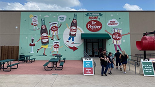 The front of Dr Pepper Museum, decorated in Dr. Pepper graphics The front of Dr Pepper Museum, decorated in Dr. Pepper graphics
