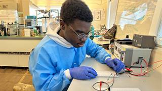 Edwin Baiden pictured in the physics lab.