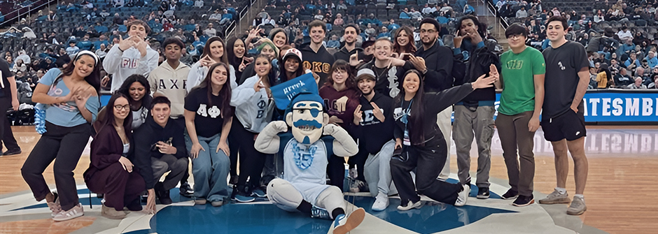 Members of fraternities and sororities at Seton Hall with the Seton Hall Pirate at the Prudential Center during half time.