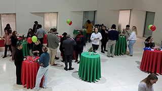 Graduate students at Christmas social event.