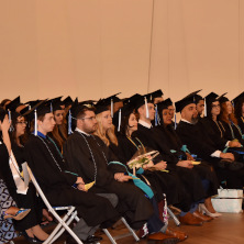 Students at Hooding Ceremony 