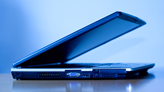 A laptop partially opened.