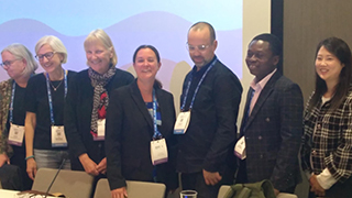Innella and others at conference in Helsinki