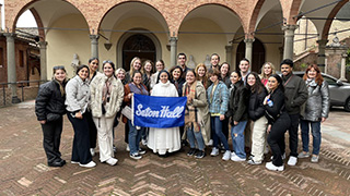 A group of Seton Hall students studying abroad.A group of Seton Hall students studying abroad.A group of Seton Hall students studying abroad.