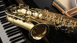 Alt saxophone on grand piano