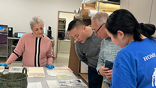 Gallery Director with Wang Family.