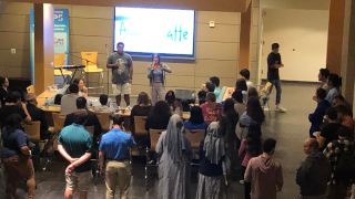 a picture of a group of students sitting together chattinga photo of a guest giving a lecturea photo of a group of students doing karaoke