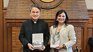 Katia Passerini with Father Luke Jongchul Won.