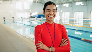 LifeGuard in front of a pool