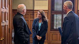 Margo Chaly meeting Monsignor Reilly
