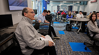 mark schild works with students