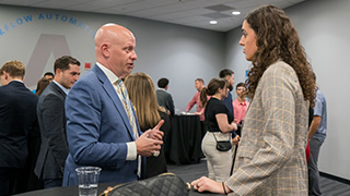 Students talking to industry professionals.