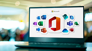 Open laptop with microsoft app logos