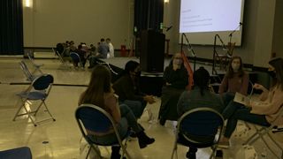Students unpack worship and formation in a small group at SEEK21.