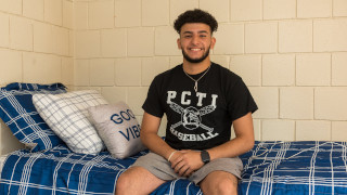 Student in dorm room