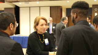 CHAMP alumni mentor and student mentee pairing. Student mentee and alumni mentor networking at the kick-off CHAMP event. Mentor Linda Karten networking with students. 