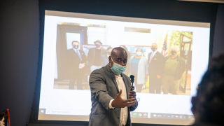 Newark Mayor Ras Baraka giving a presentation and talk