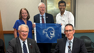 Representatives from both Universities