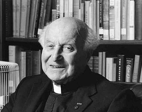 A headshot of Monsignor John M. Oesterreicher