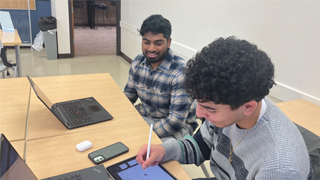 Chemistry student Mark Girgues is being tutored by his ARC tutor, Nikhil Kota, at SHU Tutopia. 