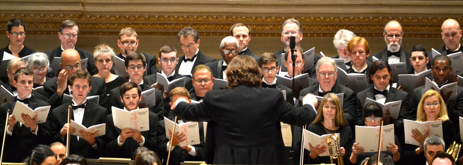 Jason Tramm conducting the Prayer for Peace Orchestra. 