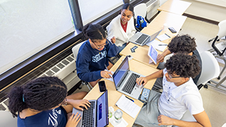 Immersive Learning: Students engage in collaborative classroom discussions on Seton Hall's vibrant South Orange campus.