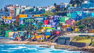 picture of colorful houses in Puerto Rico by the beach