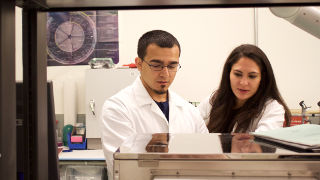 Keith Smith and Rachel Montel in the laboratory. 