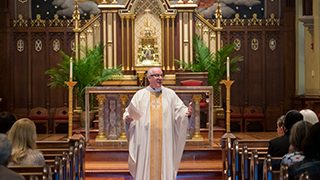 Rev. Msgr. Joseph R. Reilly, S.T.L., Ph.D., preaches at a Mass at the Chapel of the Immaculate Conception