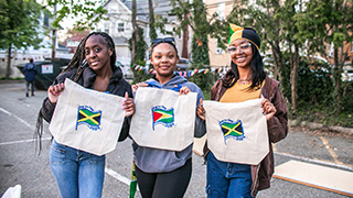 Students representing their country flags