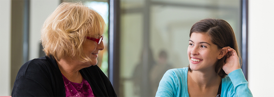 Image of a graduate female counseling professional with a student