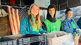 A photo of students volunteering.