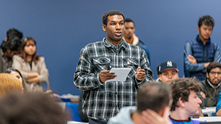 Student from audience asking a question.