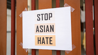 Stop Asian Hate sign was attached on the house fence
