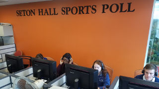 Students participating in sports poll calling.