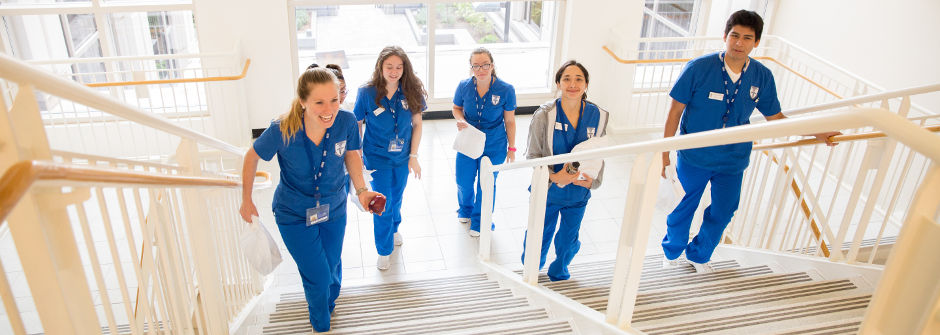 Students walking up stairs on the IHS Campus.