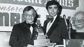 Buddy Fortunato presents the Italian Tribune News Journalistic Award to Anthony Zoppi during the 1976 Columbus Day Dinner, MSS 0018