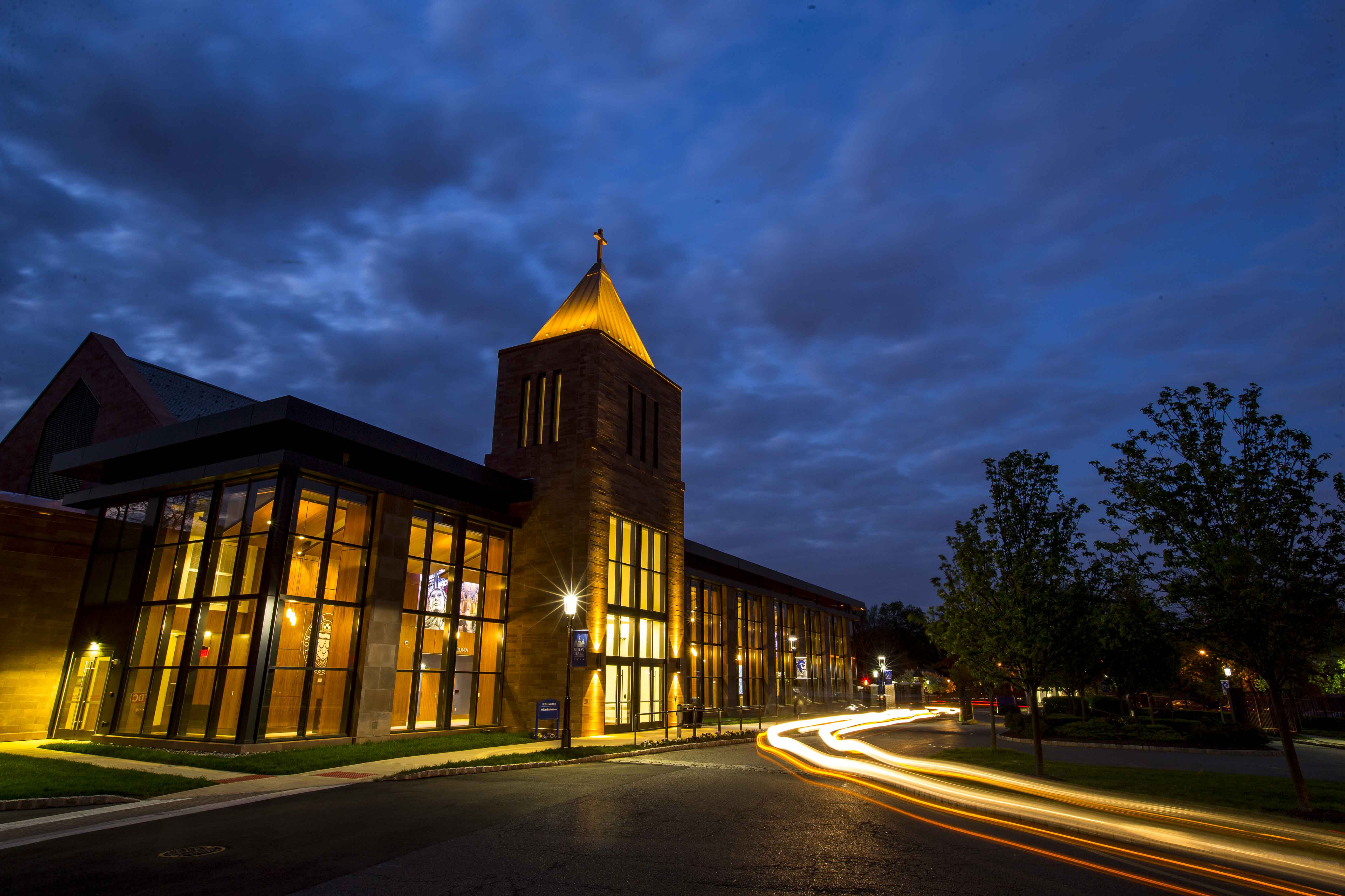 three students at a tablet