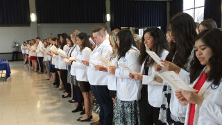 Nursing students recited the Academic Integrity Oath as part of the White Coat Ceremony.