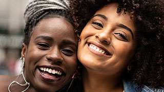 Two Women Smiling