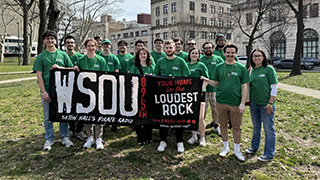 WSOU staff march in parade.