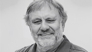 black and white headshot of Slavoj Žižek 