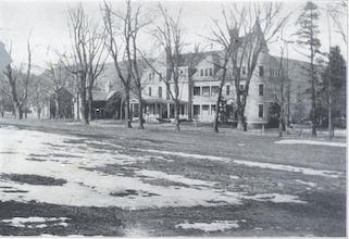 Left: 1927. The Saint Thomas Philosophy House, the former Darling family summer home, with the parish church on the left. - AAN