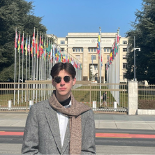 Image of diplomacy student Patrick Condon in front of the Graduate Institute for International and Development Studies in Geneva, Switzerland. 