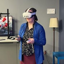 Faculty member using the Meta Quest 3 headset during the Meta demonstration.